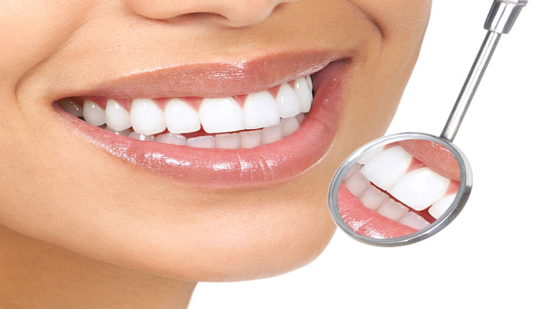 What Are The Benefits Of Tooth-Colored Bonding And Recontouring?